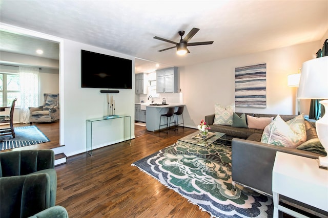8803 Westglen Dr, Dallas, TX 75228 - living area featuring ceiling fan and dark wood-style flooring