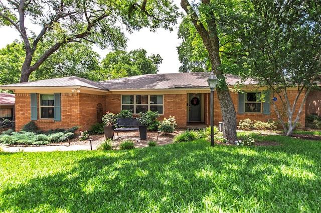 8803 Westglen Dr, Dallas, TX 75228 - single story home featuring a front yard and brick siding