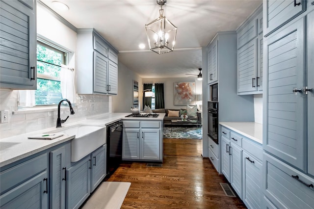 8803 Westglen Dr, Dallas, TX 75228 - kitchen featuring black appliances, open floor plan, dark wood-type flooring, a peninsula, and tasteful backsplash