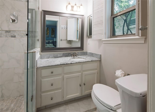 8803 Westglen Dr, Dallas, TX 75228 - ensuite bathroom with a stall shower and vanity
