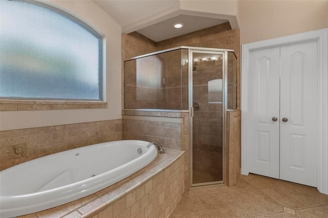 3804 Park Flower Ct, Arlington, TX 76017 - bathroom featuring a garden tub, a shower stall, and tile patterned flooring