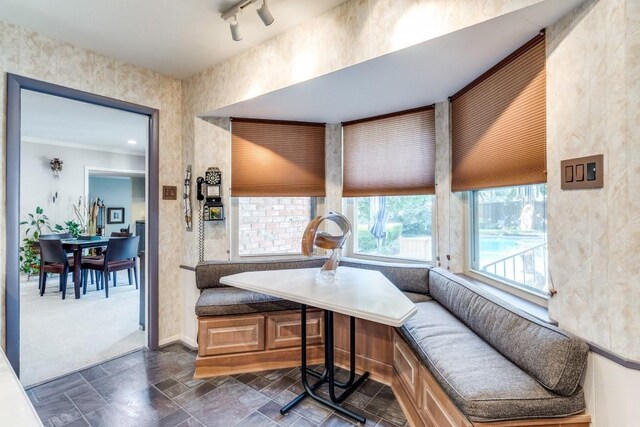 5715 Northaven Rd, Dallas, TX 75230 - office area featuring dark stone finish floors and track lighting