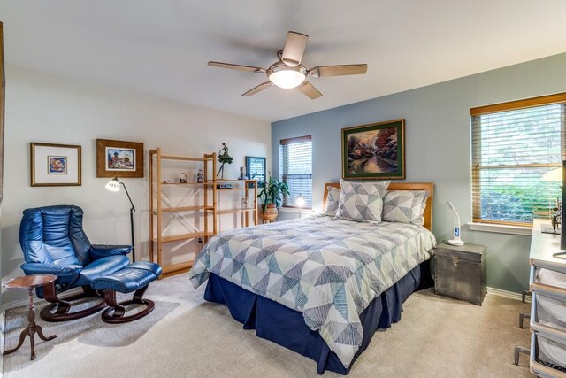 5715 Northaven Rd, Dallas, TX 75230 - carpeted bedroom featuring baseboards and a ceiling fan