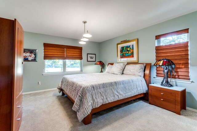 5715 Northaven Rd, Dallas, TX 75230 - carpeted bedroom with baseboards