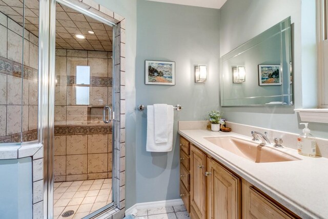 5715 Northaven Rd, Dallas, TX 75230 - full bath featuring vanity, a stall shower, recessed lighting, and tile patterned flooring