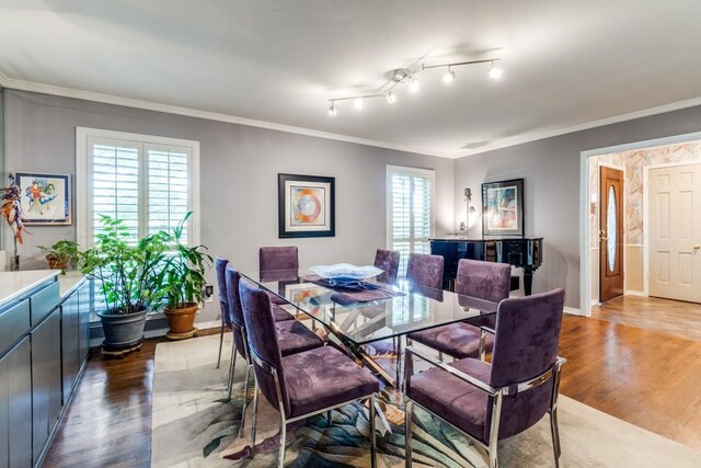 5715 Northaven Rd, Dallas, TX 75230 - dining area featuring wood finished floors and ornamental molding