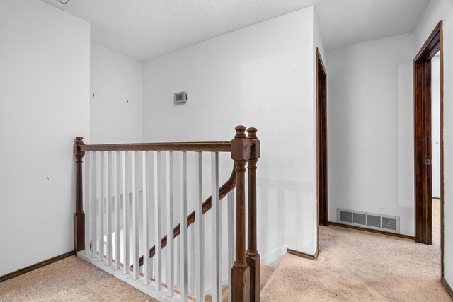 2214 Parkside Dr, Denton, TX 76201 - hall featuring an upstairs landing and carpet