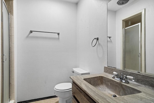 2214 Parkside Dr, Denton, TX 76201 - bathroom featuring vanity and a shower stall
