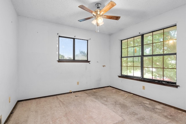 2214 Parkside Dr, Denton, TX 76201 - carpeted spare room with ceiling fan and a textured ceiling