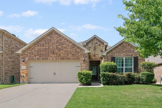 1508 Westborough Dr, Northlake, TX 76226 - view of front of house featuring driveway, a garage, brick siding, a front yard, and stone siding