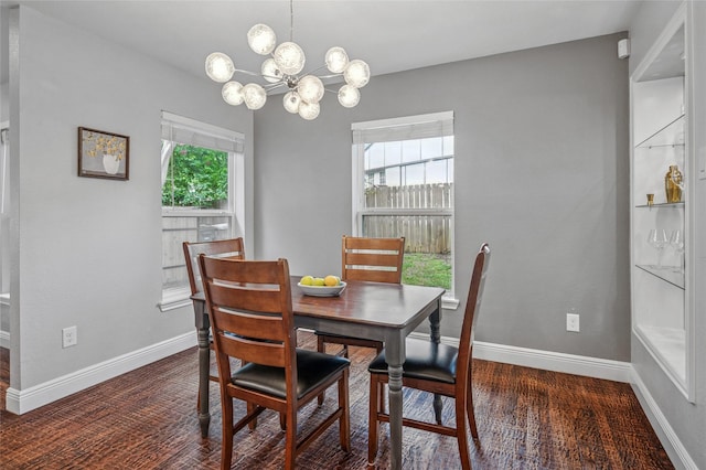 2711 El Tivoli Dr, Dallas, TX 75211 - dining area featuring a chandelier and wood finished floors