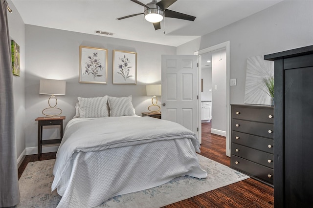 2711 El Tivoli Dr, Dallas, TX 75211 - bedroom with wood finished floors and ceiling fan