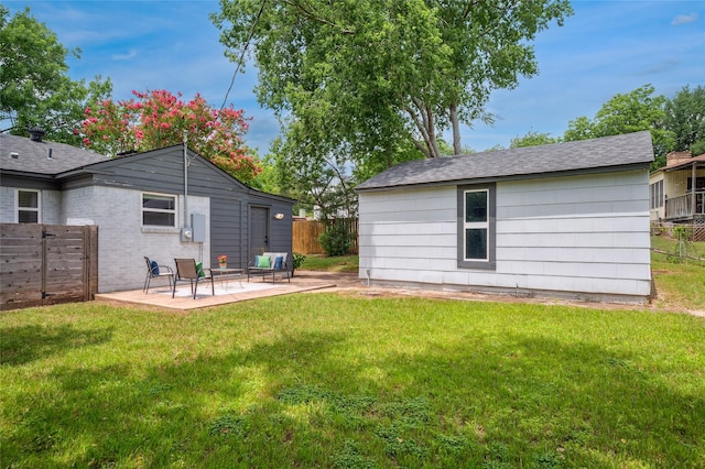 2711 El Tivoli Dr, Dallas, TX 75211 - view of yard featuring a patio area and outdoor lounge area