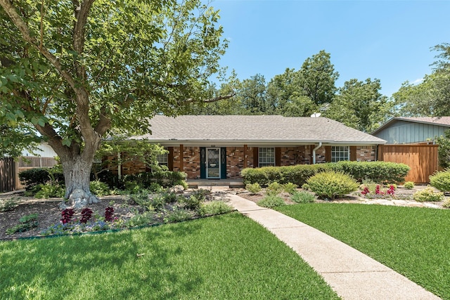 13861 Far Hills Ln, Dallas, TX 75240 - single story home featuring brick siding, a shingled roof, and covered porch