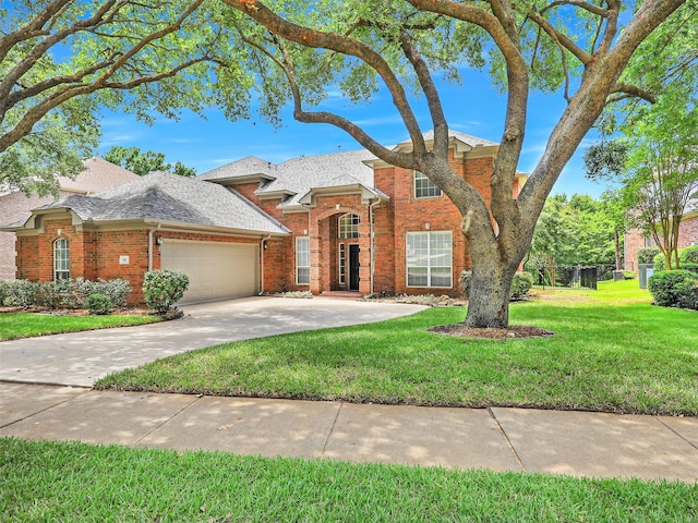 925 Canongate Dr, Flower Mound, TX 75022 - traditional-style house with brick siding, a garage, a front yard, and concrete driveway