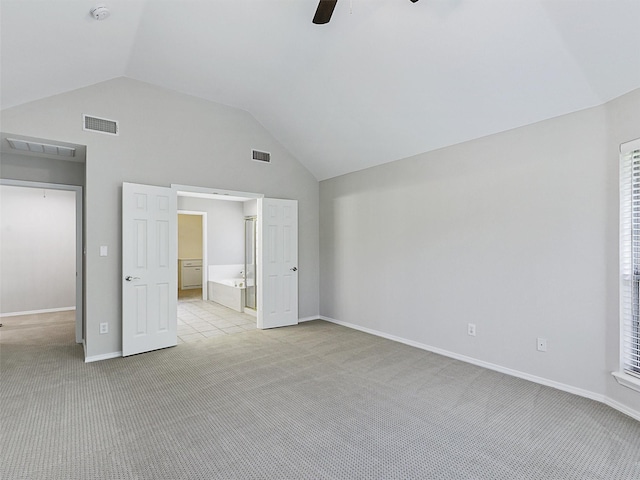 925 Canongate Dr, Flower Mound, TX 75022 - unfurnished bedroom featuring light colored carpet, lofted ceiling, ceiling fan, and connected bathroom