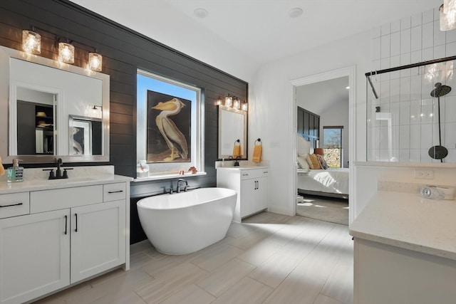 204 Big Sky Cir, Northlake, TX 76226 - ensuite bathroom with two vanities, a freestanding bath, a stall shower, and lofted ceiling