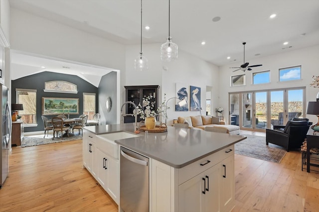 204 Big Sky Cir, Northlake, TX 76226 - kitchen featuring stainless steel appliances, a ceiling fan, open floor plan, light wood finished floors, and recessed lighting