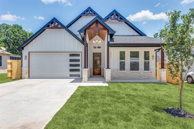 3020 Pueblo Trl, Lake Worth, TX 76135 - view of front of house with board and batten siding, stone siding, a shingled roof, a garage, and concrete driveway