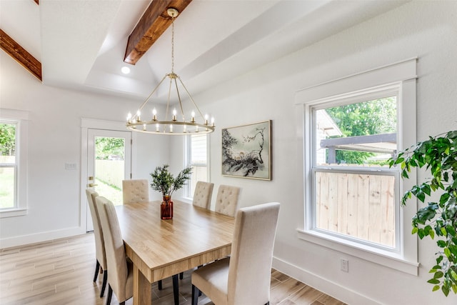 3020 Pueblo Trl, Lake Worth, TX 76135 - dining space featuring beam ceiling, a chandelier, light wood finished floors, and plenty of natural light