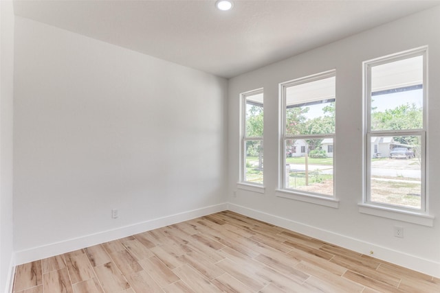3020 Pueblo Trl, Lake Worth, TX 76135 - unfurnished room featuring light wood-style floors and recessed lighting