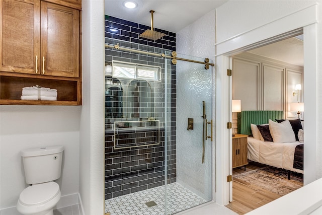 3020 Pueblo Trl, Lake Worth, TX 76135 - ensuite bathroom with a shower stall and wood finished floors