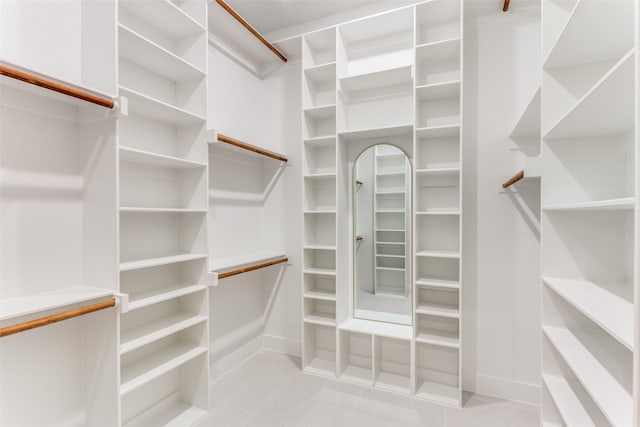 3020 Pueblo Trl, Lake Worth, TX 76135 - spacious closet featuring light tile patterned floors