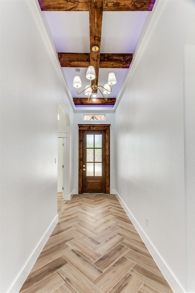 3020 Pueblo Trl, Lake Worth, TX 76135 - entryway featuring coffered ceiling, arched walkways, a chandelier, and beam ceiling