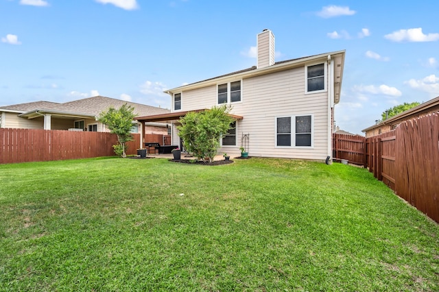 13341 Ridgepointe Rd, Fort Worth, TX 76244 - rear view of house featuring a fenced backyard, a chimney, and a patio area