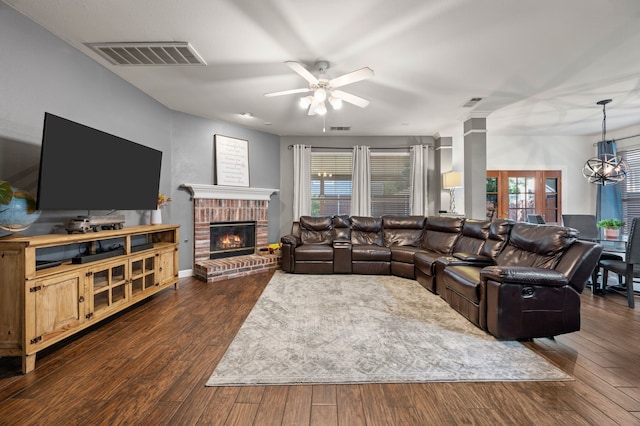 13341 Ridgepointe Rd, Fort Worth, TX 76244 - living area with ceiling fan, a fireplace, dark wood-type flooring, and plenty of natural light