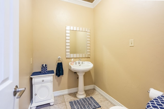 1450 Meandering Way, Rockwall, TX 75087 - half bathroom with crown molding and tile patterned flooring