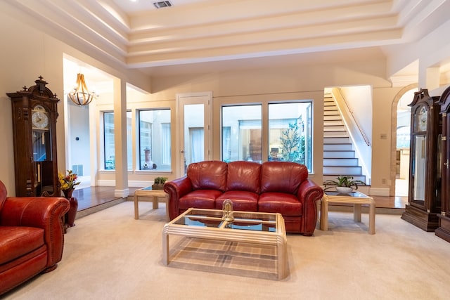 1450 Meandering Way, Rockwall, TX 75087 - living room featuring a chandelier, stairs, light colored carpet, and a high ceiling