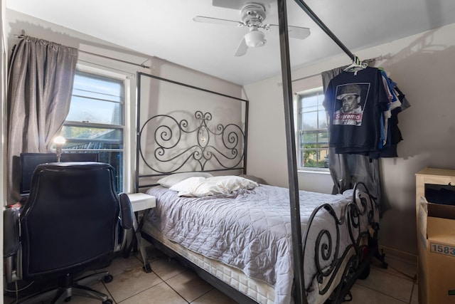 735 Wren Ave, Duncanville, TX 75116 - bedroom with tile patterned flooring and ceiling fan