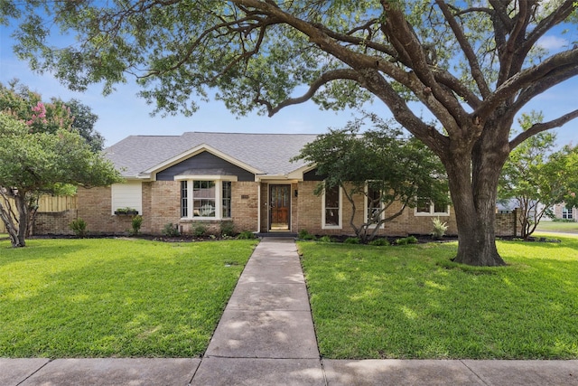 1100 Longworth Dr, Plano, TX 75075 - ranch-style house with a front lawn, brick siding, and a shingled roof