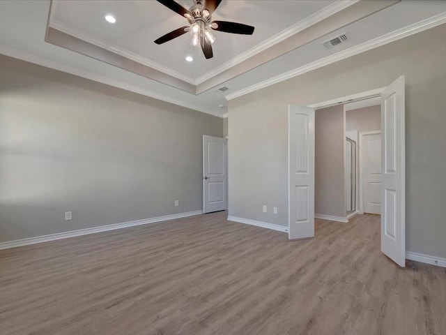 106 Saddle Brook Dr, Lufkin, TX 75904 - unfurnished bedroom featuring light wood-style floors, crown molding, recessed lighting, a raised ceiling, and ceiling fan