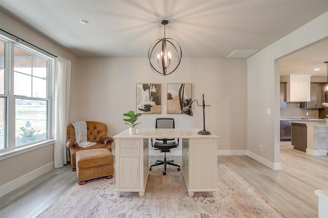 619 Latigo Ct, Weatherford, TX 76088 - office space with light wood-style flooring, plenty of natural light, and a chandelier