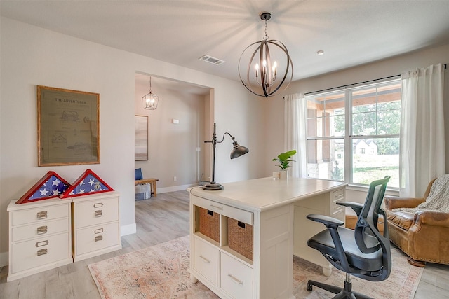 619 Latigo Ct, Weatherford, TX 76088 - home office with a chandelier and light wood-type flooring