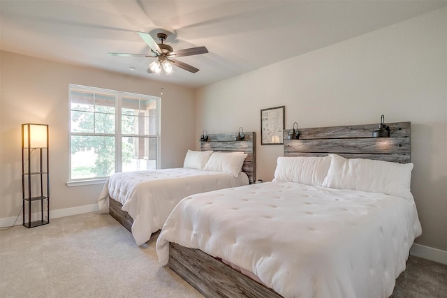 619 Latigo Ct, Weatherford, TX 76088 - bedroom featuring light colored carpet and ceiling fan