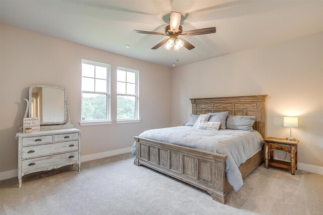 619 Latigo Ct, Weatherford, TX 76088 - bedroom featuring light colored carpet and a ceiling fan