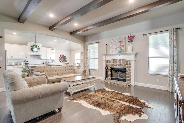 404 Bluffside Trl, Benbrook, TX 76126 - living room with a fireplace, beamed ceiling, recessed lighting, and dark wood-style floors