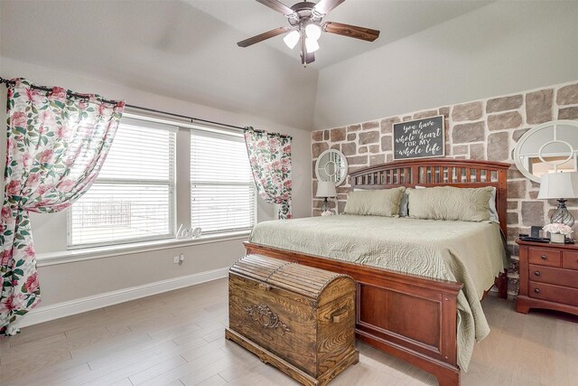 404 Bluffside Trl, Benbrook, TX 76126 - bedroom featuring vaulted ceiling, light wood-type flooring, and ceiling fan