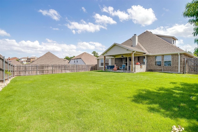 404 Bluffside Trl, Benbrook, TX 76126 - back of property with a chimney, brick siding, a fenced backyard, a patio, and a shingled roof