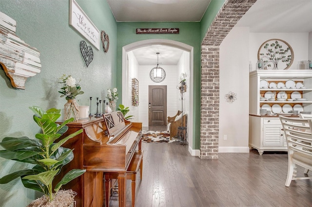 404 Bluffside Trl, Benbrook, TX 76126 - entryway with arched walkways and dark wood-type flooring