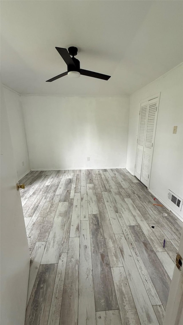 1705 Morningstar Trl, Richardson, TX 75081 - unfurnished room with wood-type flooring and a ceiling fan
