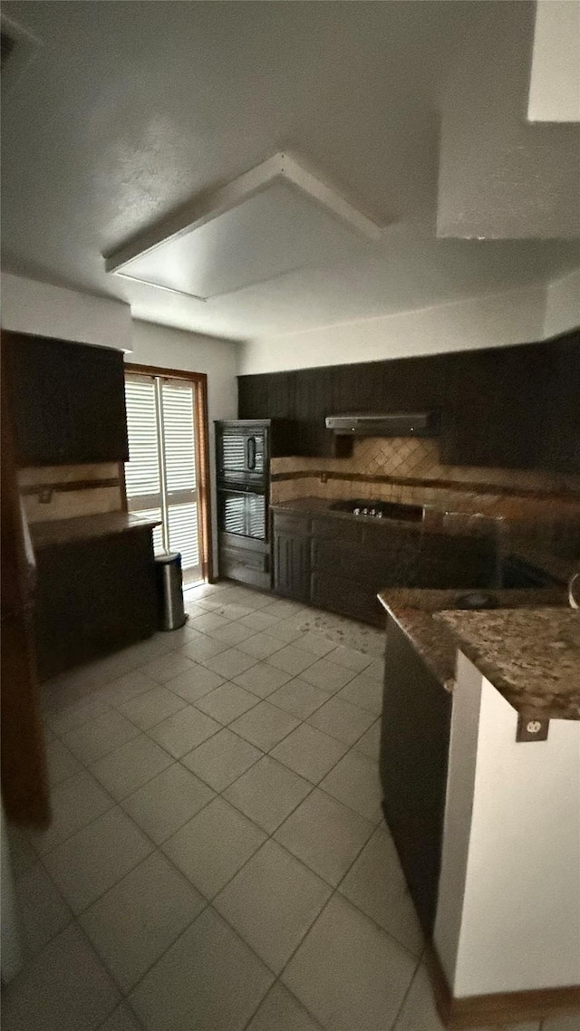 1705 Morningstar Trl, Richardson, TX 75081 - kitchen with tile patterned flooring, exhaust hood, and dark countertops