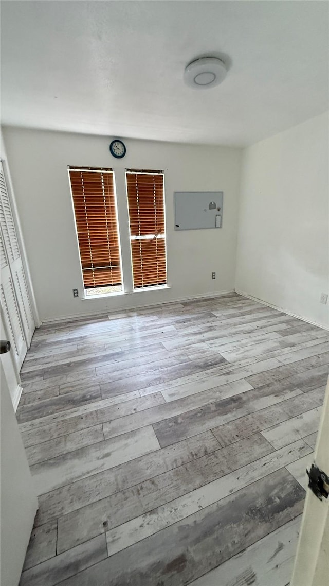 1705 Morningstar Trl, Richardson, TX 75081 - spare room featuring hardwood / wood-style floors