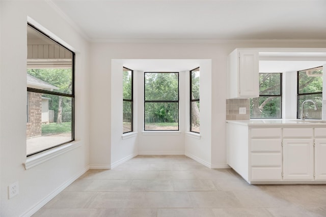 3801 Woodside Dr, Arlington, TX 76016 - empty room featuring crown molding and light tile patterned floors