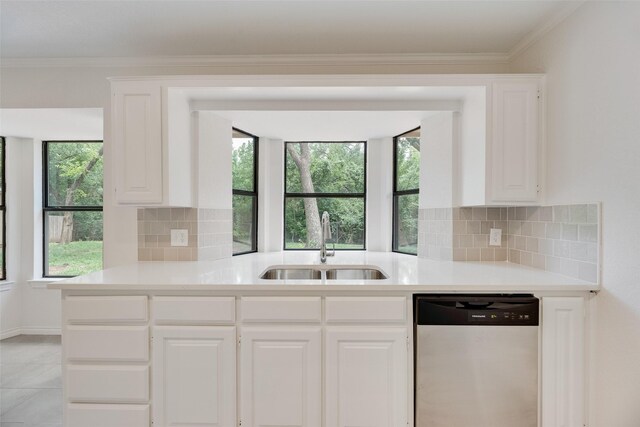 3801 Woodside Dr, Arlington, TX 76016 - kitchen featuring dishwasher, light countertops, tasteful backsplash, and crown molding