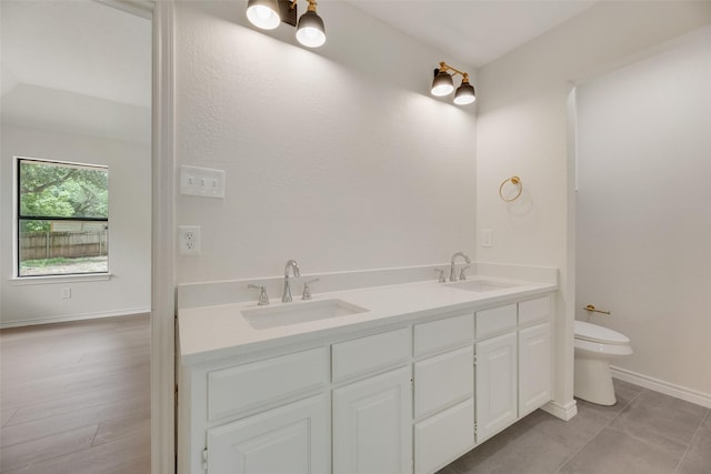 3801 Woodside Dr, Arlington, TX 76016 - full bath featuring double vanity and tile patterned flooring