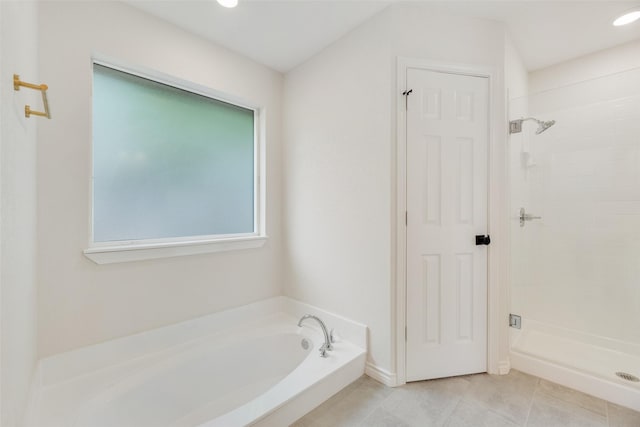 3801 Woodside Dr, Arlington, TX 76016 - full bathroom featuring a garden tub, a stall shower, and tile patterned floors